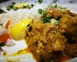 A picture of step 12 of Mango chicken Curry.
