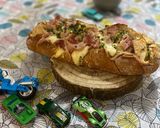 Foto del paso 6 de la receta: Pan relleno de mucho queso y bacon para niños 🧀