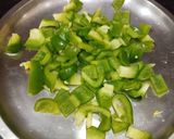 A picture of step 1 of Potato & Capsicum Subji.