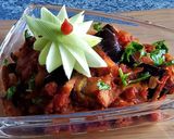 A picture of step 6 of Baked Brinjals and Papers.