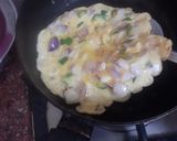 A picture of step 5 of Desi omelette.