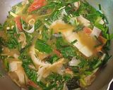 Hình bước làm 4 của món Canh chua đầu cá nheo nấu măng