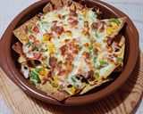 A picture of step 4 of Nachos with Meat and Peppers.