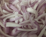 A picture of step 1 of Kanda Bhajiya.