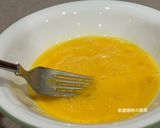 A picture of step 7 of Eggy Curry Pan-Fried Tangyuan.