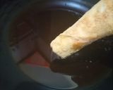 A picture of step 8 of Crispy tikka spaghetti Chicken roll.