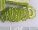 Foto langkah ke 1 dari resep Tumis Pare Telur Orak Arik.