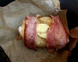 A picture of step 3 of My Chicken breast with Brie and Streaky bacon wrapped around. 😋.