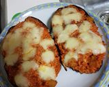 Foto del passaggio 4 della ricetta Melanzane al forno ripiene di riso al sugo e mozzarellaRICETTA