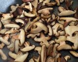 A picture of step 2 of Black rice shiitake mushroom risotto.