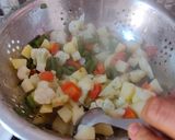 A picture of step 4 of Vegetable Korma.