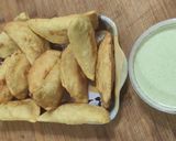 Foto del paso 8 de la receta: Empanada Venezolana de Pollo desmechado 🐔 y Salsa de Ajo 🧄🌿
