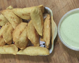 Foto del paso 8 de la receta: Empanada Venezolana de Pollo desmechado 🐔 y Salsa de Ajo 🧄🌿