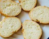 Hình bước làm 2 của món Bánh Mì Lát Dưa Chua & Cá Cơm Muối
