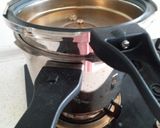 A picture of step 13 of Red valvet eggless cake in cooker.
