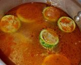 صورة لخطوة 4 من وصفة 🍲 طاجين الحمص بالكورجات والبطاطا المحشية