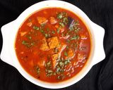 A picture of step 14 of AlOO BESAN TARAKARI.