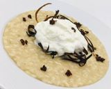 Foto del passaggio 10 della ricetta Risotto Riserva Cascina Alberona con Melanzane, Stracciatella e Guanciale
