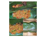 A picture of step 3 of Fish polichathu with Banana leaf.