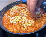 Foto del paso 7 de la receta: Enchiladas de pollo con piparras