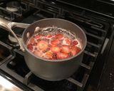 A picture of step 1 of Fresh Strawberry Simple Syrup.