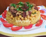 A picture of step 8 of Maqluba with Chickpeas and Beef.
