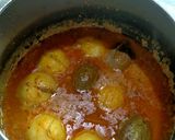 A picture of step 4 of Stuff Aloo Baingan.