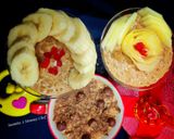 A picture of step 7 of Doodh daliya in pressure cooker (with different toppings).