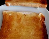 A picture of step 1 of Simple Sausage on Toast.