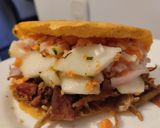 Foto del paso 15 de la receta: Arepa🥯rellena de pollo🫕y salchichón teriyaky con ensalada fresca🥙🧆🌯