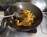 A picture of step 2 of Kale chane and pumpkin sabji with roti and mango puree.