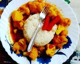 A picture of step 5 of Gobhi sabzi with rice.