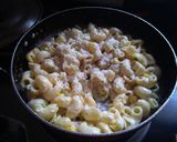 A picture of step 7 of Cheesy corn Macaroni.