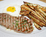 Foto del paso 3 de la receta: BISTEC CON HUEVO FRITO Y PAPAS HORNEADAS CON CHAQUETA. JON STYLE