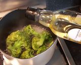A picture of step 12 of Slow Cooked Shredded Beef. Roast Spuds and Roasted Broccoli.