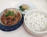 รูปขั้นตอนการทำที่ 7 ของ ขนมจีนน้ำเงี้ยวใส่ขาไก่