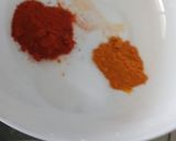 A picture of step 1 of Raw Mango carrot green chili garlic pickle.