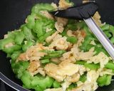 A picture of step 10 of Bitter gourd with egg.
