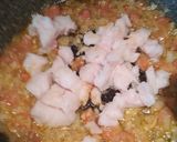 Foto del paso 3 de la receta Pimientos rellenos de arroz, merluza y tomate