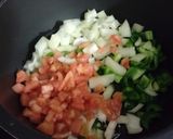 Foto del paso 5 de la receta Guiso de bacalao, calamares y langostinos
