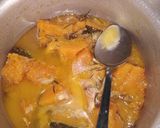 A picture of step 7 of Pumpkin soup with chia seeds toppings, garnished with coriander.