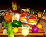 A picture of step 1 of Mike's 40 Clove Baked Garlic Stuffed Game Hens & Veggies.