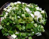 A picture of step 7 of Aloo matar gravy with Hari pyaz ki bhujiya.