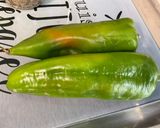 A picture of step 1 of Grilled Peppers Marinated with Celery Pesto.