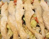 A picture of step 3 of Veg and salmon tray bake.