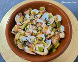 Foto del paso 7 de la receta: Wok de calçots, pota y almejas