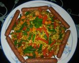 A picture of step 7 of Stir-fried curry noodles and sausages.