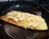Foto del paso 4 de la receta: Omelette con cebollita y muzzarella