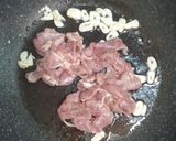 A picture of step 2 of Pad See Ew with Pork & Chinese Broccoli.