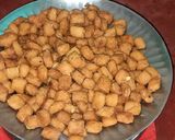 A picture of step 7 of Coconut Shakkar Pare.